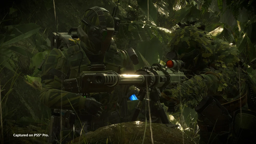 Official AMW-20 Apex scene showing a long rifle and two Helldivers in a forest.
